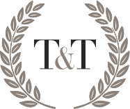 Emblema T&T con corona d’alloro dello Studio Legale Tacchi & Tosini
